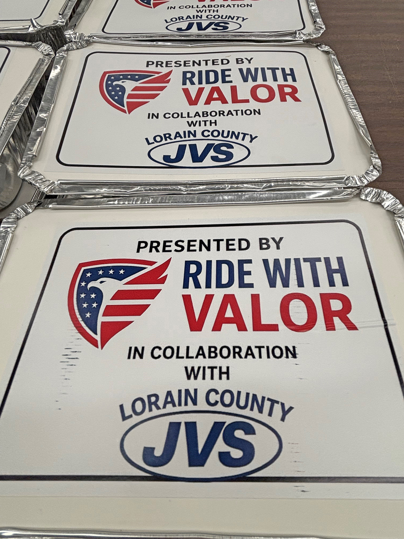 food in container with ride with valor and lcjvs logos